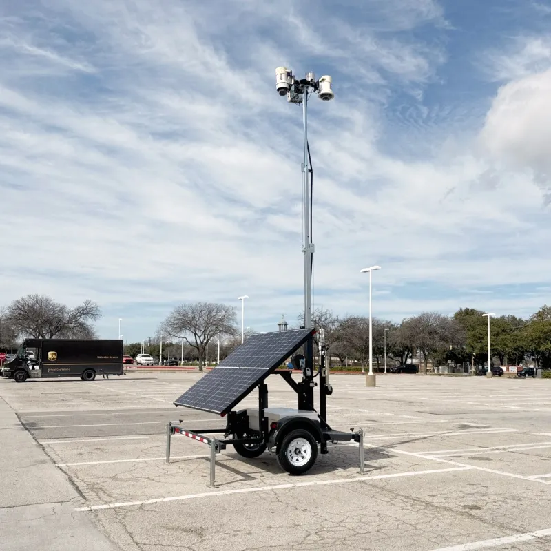 Powerhouse Guardians solar security trailer with telescoping camera mast deployed in a parking lot